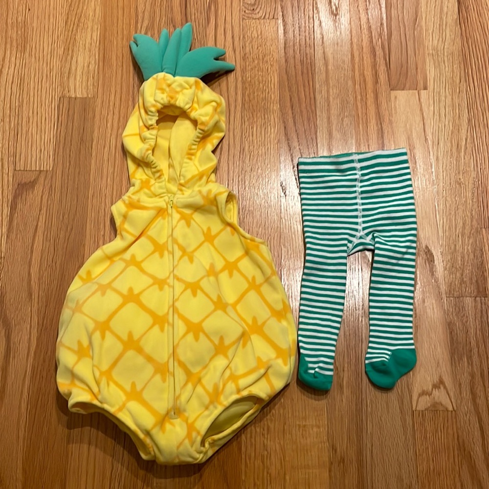 Adorable pineapple Halloween costume from Carter’s.  3-6 months - worn once.